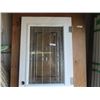 Image 2 : Solid Exterior Door with Window 79" x 32" - has dent on 1 side