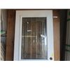 Image 5 : Solid Exterior Door with Window 79" x 32" - has dent on 1 side