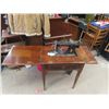 Image 1 : Electric Singer Sewing Machine in Cabinet
