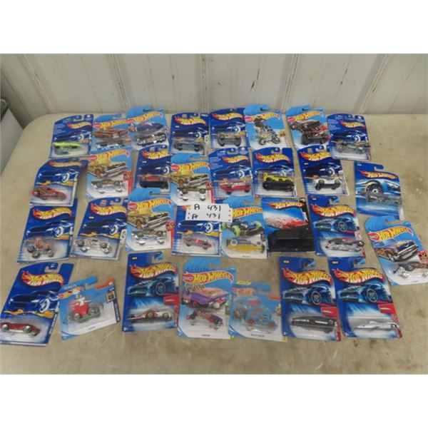 31 Hot Wheels in Packaging Including Mystery Vehicle