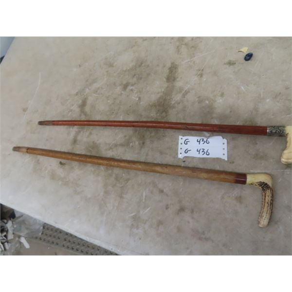 2 Walking Sticks with Carved Bone Handle