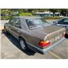 Image 2 : *R**TOW* 1987 MERCEDES BENZ 300E. 4DR SEDAN, GOLD, VIN # WDBEA30D9HA448121