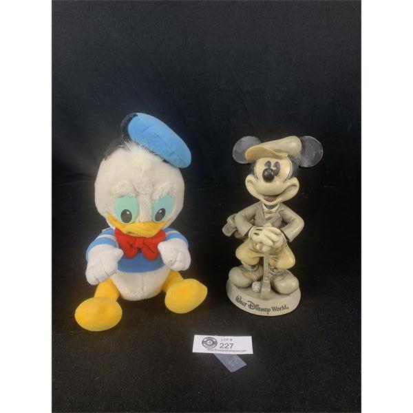 Golfer Mickey Mouse Bobblehead and a stuffied Baby Donald Duck