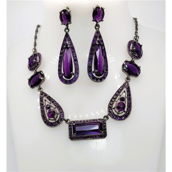 27)  AMETHYST COLORED CRYSTAL NECKLACE AND