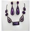 27)  AMETHYST COLORED CRYSTAL NECKLACE AND