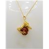 Image 1 : 26)  GOLD TONE DRAGON HOLDING A  CHERRY