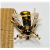 Image 1 : 21)  VERY LIFELIKE GOLD TONE WITH BLACK AND