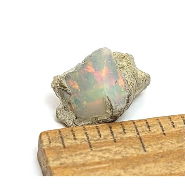 7)  NATURAL ROUGH ETHIOPIAN FIRE OPAL, 4 CT.