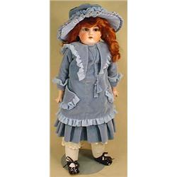 ANTIQUE GERMAN BISQUE DOLL W/ LEATHER BODY IN PERI