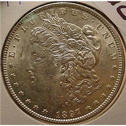 1897-P MORGAN SILVER DOLLAR - UNC.