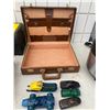 Image 1 : Leather brief case and Avon collectibles
