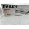 Image 1 : Vacuum bag sealer