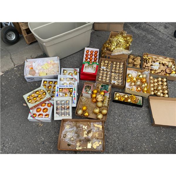 Vintage and other Christmas ornaments in bin with lid