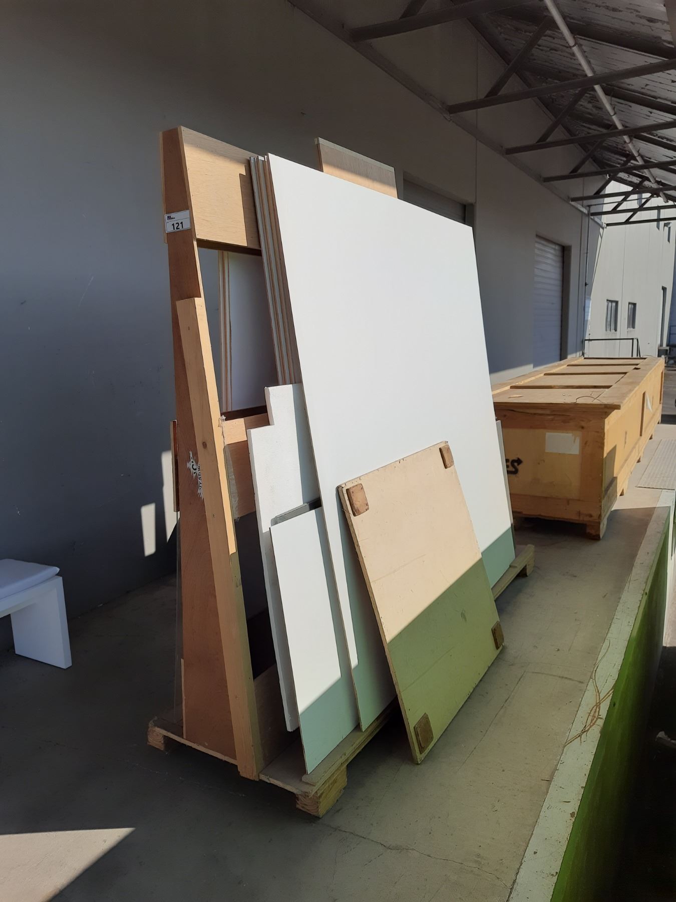 WOOD A-FRAME STORAGE RACK WITH CONTENTS OF WHITE ROAD SHOW WALL, MOBILE ...