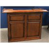 Image 1 : SHOWROOM 60" SERVING BAR. BROWN WOOD FINISH. STORAGE SHELVING INSIDE. 45"L X 60"W X 27.5"D.