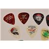 Image 2 : Collection of (13) Willie Nelson Guitar Picks