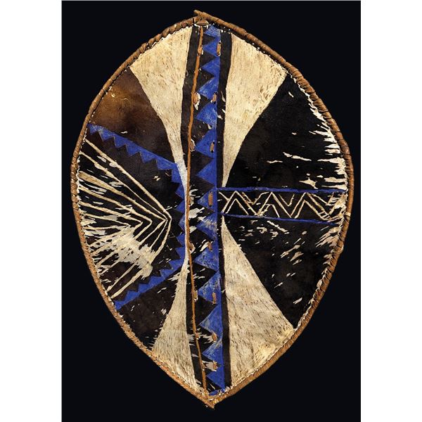 AFRICAN COWHIDE BATTLE SHIELD.