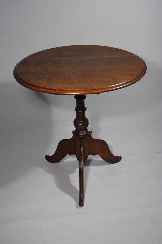 A Victorian Walnut Tilt Top Table.