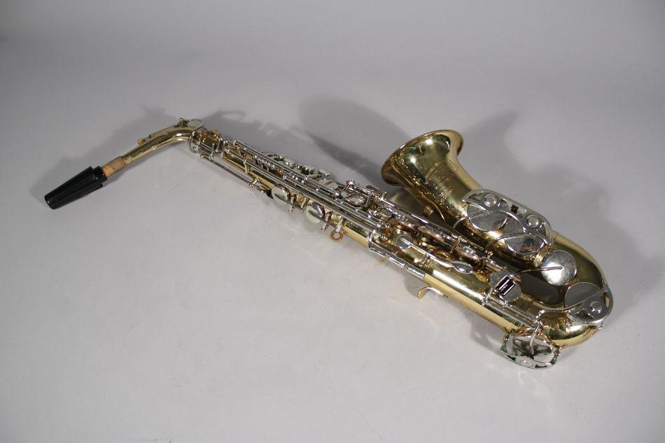 A Selmer Bundy II Brass and Chrome Alto Saxophone.