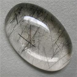 46.57 CTS OVAL RUTILATED QUARTZ CABOCHON 31x20 MM
