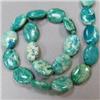 Image 1 : 20x15 MM OVAL STABILIZED TURQUOISE STRAND - 16 INCHES