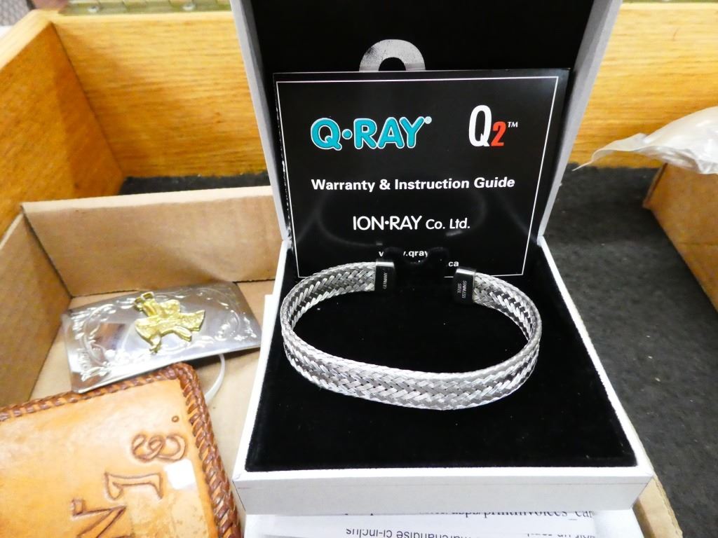 QRay bracelets & belt buckles