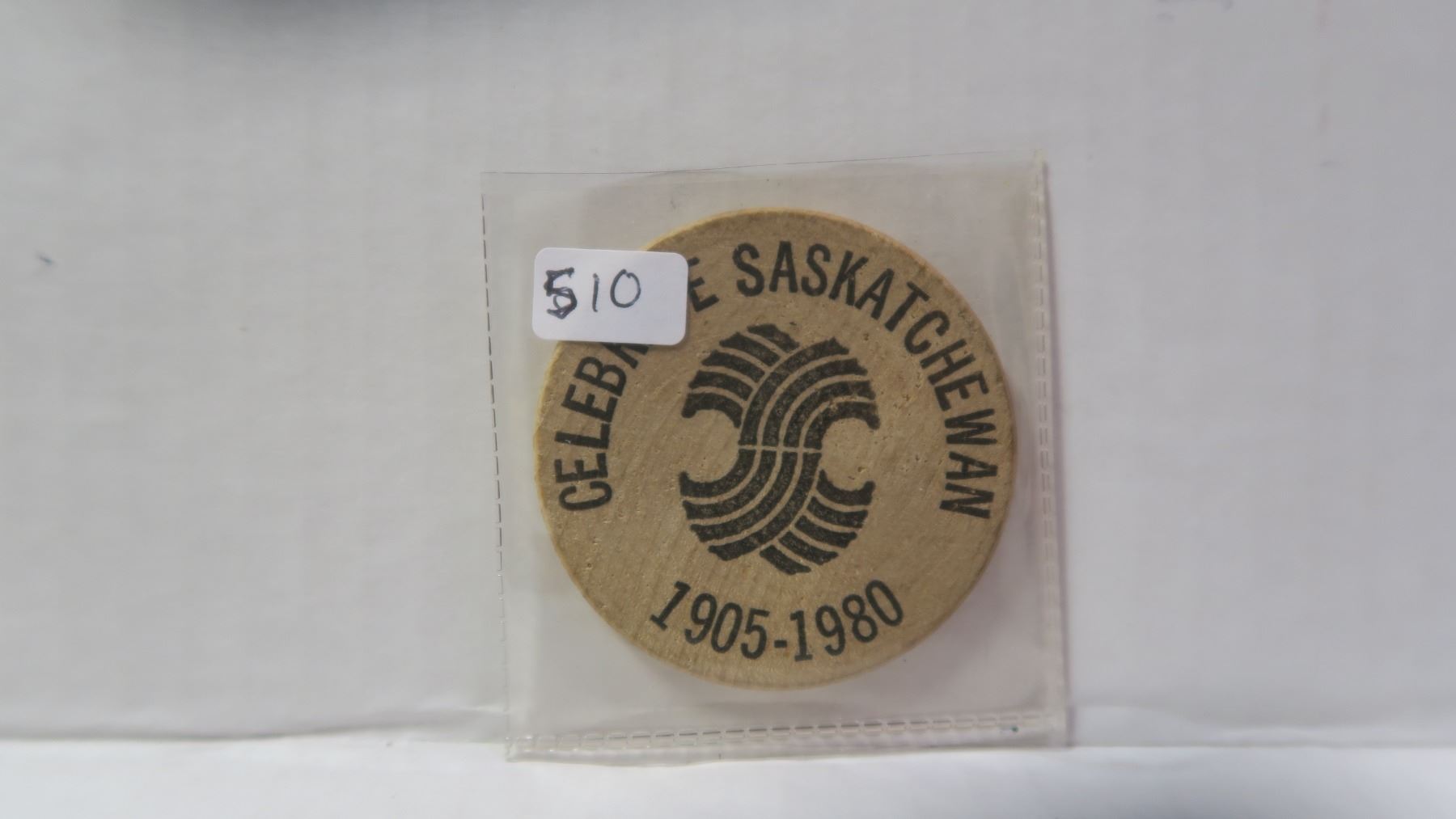 1905 1980 Celebrate Saskatchewan Wood. 2” Wood issued by Esterhazy in