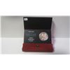2005 Silver Dollar. Commemorates the 40th Anniversary of Canada’s national flag. 99.99 pure Silver. 
