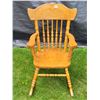 Image 1 : Vintage child's wood rocking chair. Ornate back with spindles.