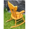 Image 3 : Vintage child's wood rocking chair. Ornate back with spindles.