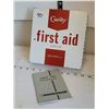 Image 1 : Older Curity wall mountable metal first aid kit & contents.