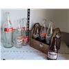 Image 1 : Vintage Coca-cola, pop shoppe, Hires & Stubby bottles in a wood carrier.