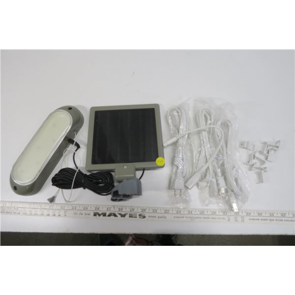 Solar-powered light, assorted power cables, fasteners