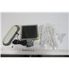 Image 1 : Solar-powered light, assorted power cables, fasteners