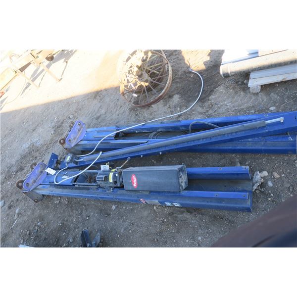 9,000lbs Potary 2 post automotive hoist, 8 ft. blue with purple arms. *needs inspection*