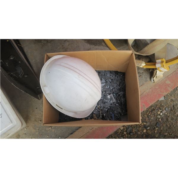 box of screws & fastners with a white hard hat