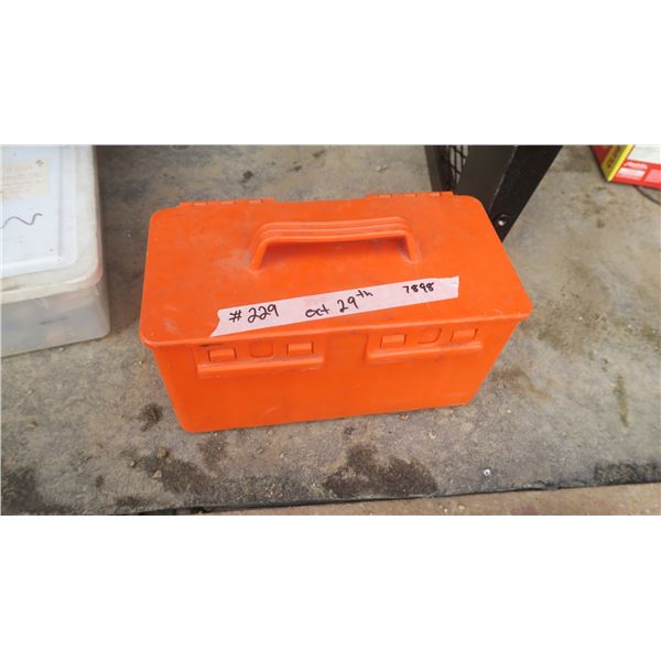 small orange box of fishing items.
