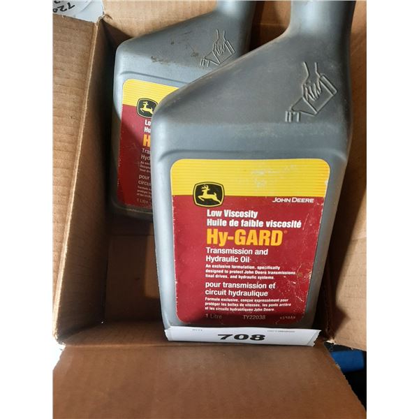 1 opened and 2 unopened JD Hy-Gard hydraulic oil