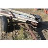 Image 2 : Double axle hay trailer with misc wood items on it
