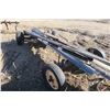 Image 7 : Double axle hay trailer with misc wood items on it