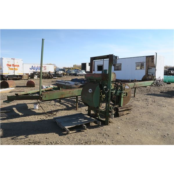 Homemade band saw saw mill, green.