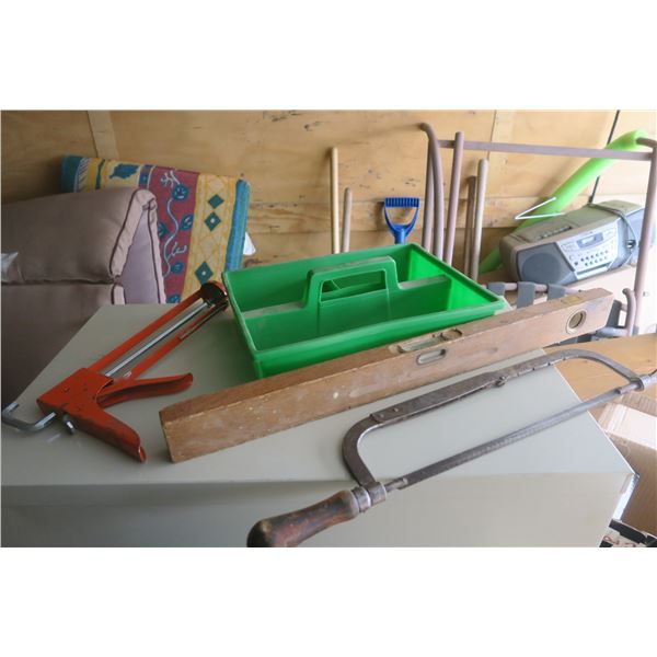 box of misc tools, caulk guns,green trey, antique OAK level, vintage hacksaw
