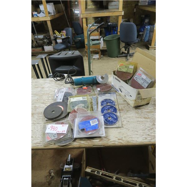 box of varous types of grinding disks & angle grinder