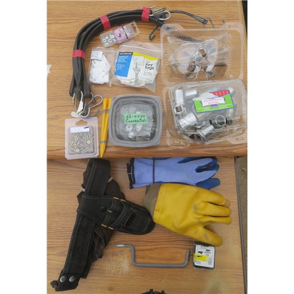 Assortment of tools: wrench sockets, gloves, connectors, safety glasses, ect