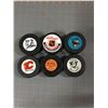 Image 1 : LOT OF NHL HOCKEY PUCKS (TAMPA BAY LIGHTNING, SAN JOSE SHARKS, CALGARY FLAMES)