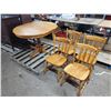 Image 1 : round hardwood table 39" w/ leaf 9.5" and four chairs