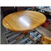 Image 2 : round hardwood table 39" w/ leaf 9.5" and four chairs