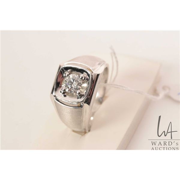 Gents 14kt white gold and .55ct round brilliant cut white diamond ring, size 10.25. Retail replaceme