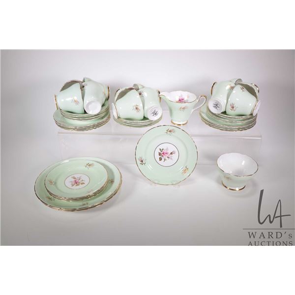 Twelve each of Sutherland H&M 3109 china tea cups, saucers and side plates plus two serving plates a