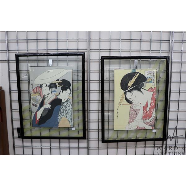 A pair of framed Kitagawa Utamaro woodblock prints including "Writing a letter- Arteslino" and two g